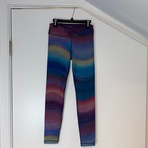 Athleta girl leggings. Perfect condition. Never worn. Rainbow colored.